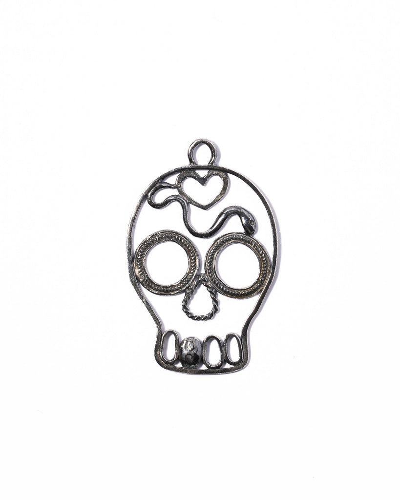 Girl with a skull earring - charm